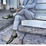 Olive green wholecut Oxford shoes for men with polished leather finish