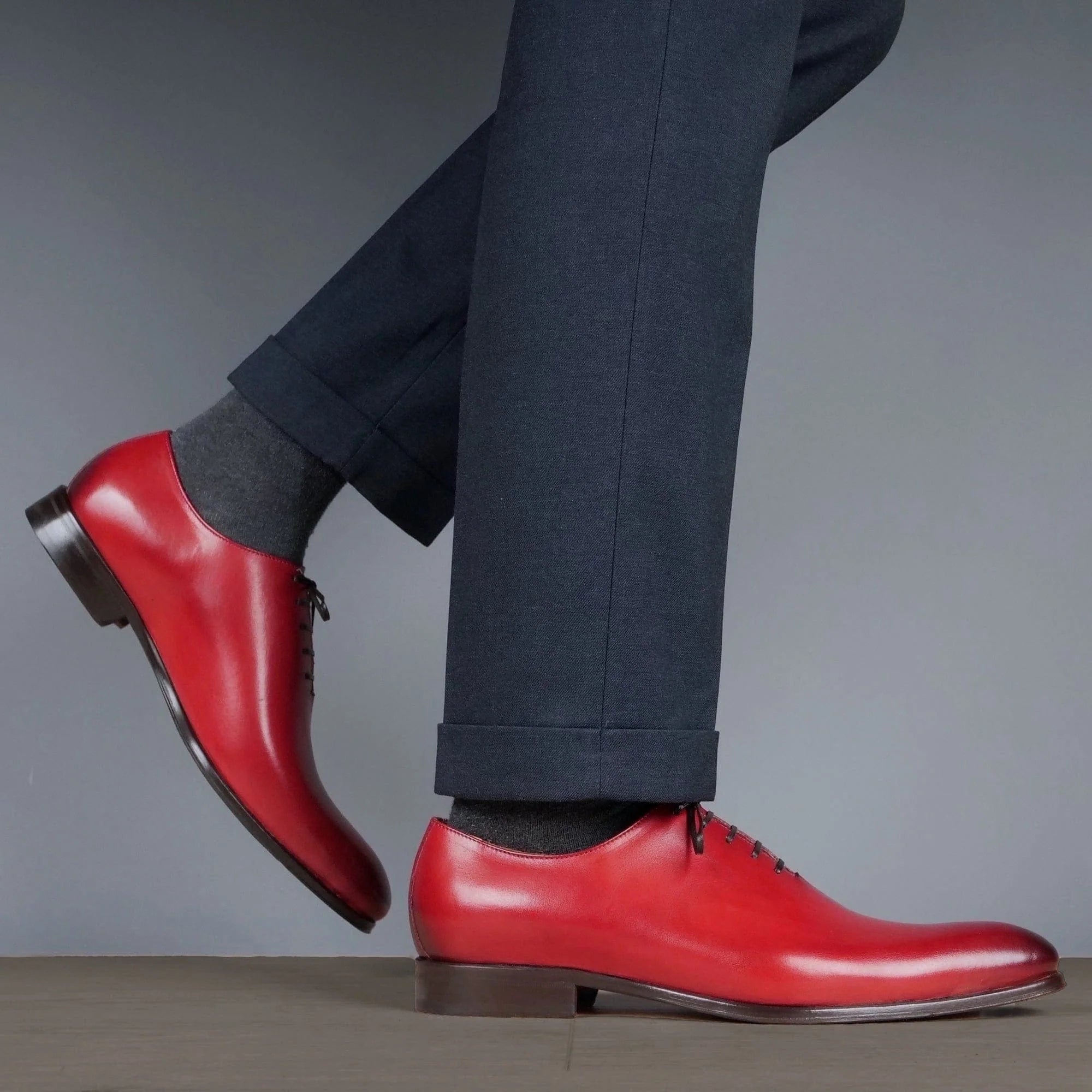 Scarlet red wholecut Oxford shoes for men, polished leather finish for style and comfort