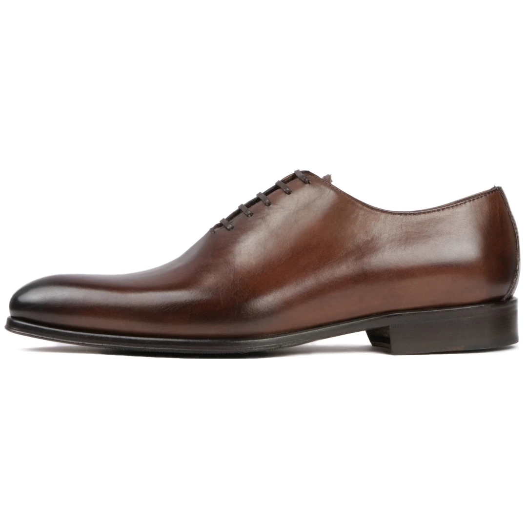 Menβs tan wholecut Oxford shoes crafted from premium leather β Benson collection
