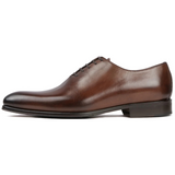 Menβs tan wholecut Oxford shoes crafted from premium leather β Benson collection