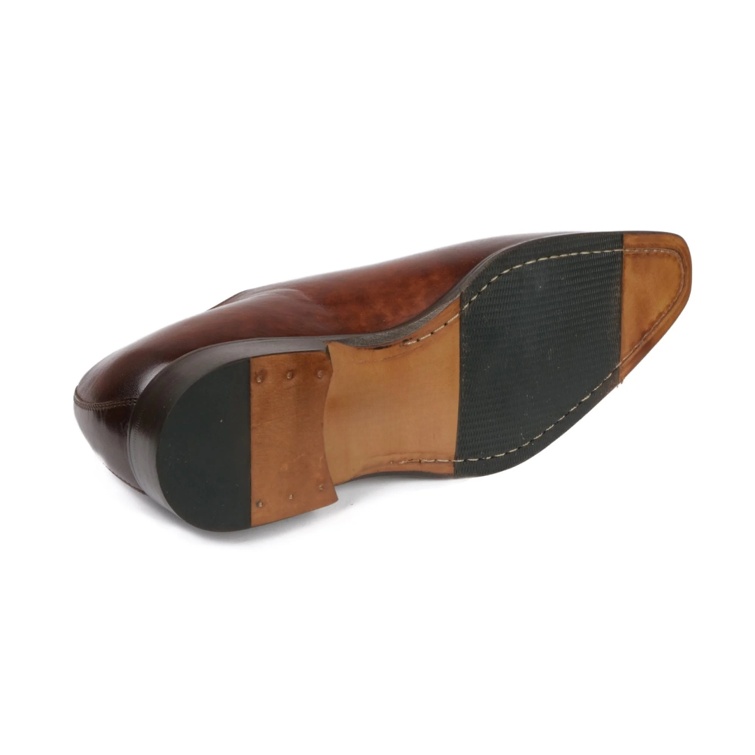 Handcrafted menβs tan leather Oxford shoes with sleek wholecut design