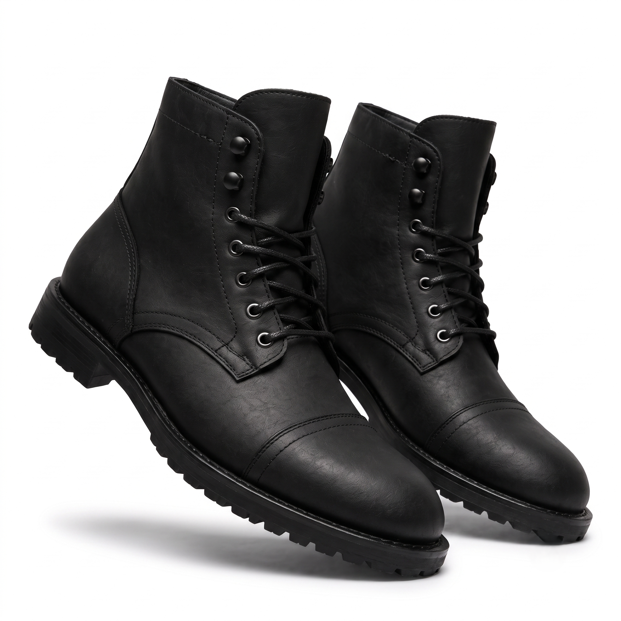 Angled view of black leather ankle boots for men