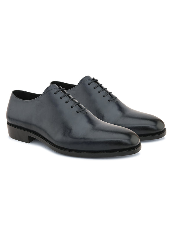 Black whole cut leather Oxford shoes for men with seamless one-piece leather and classic formal design