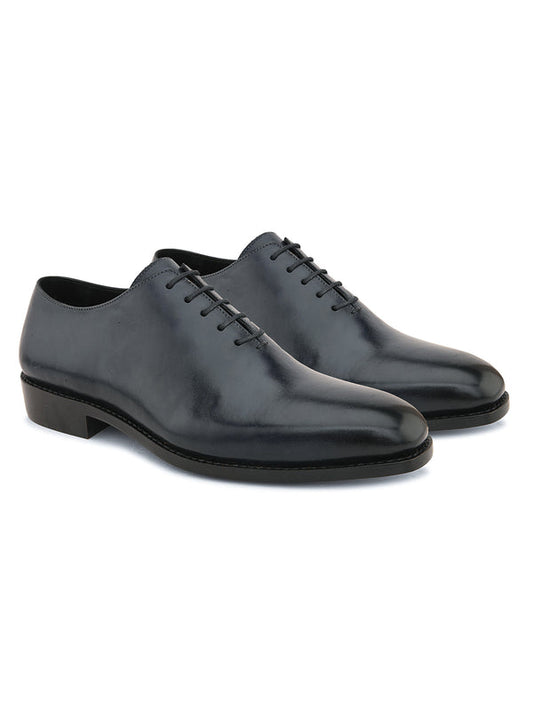 Black whole cut leather Oxford shoes for men with seamless one-piece leather and classic formal design