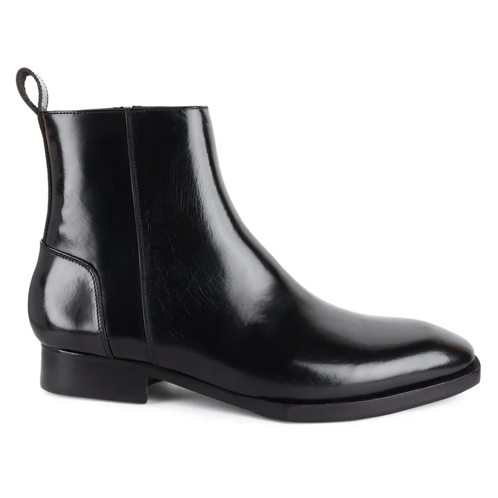 Premium black brushed leather zip boots showing spade sole and fine stitching