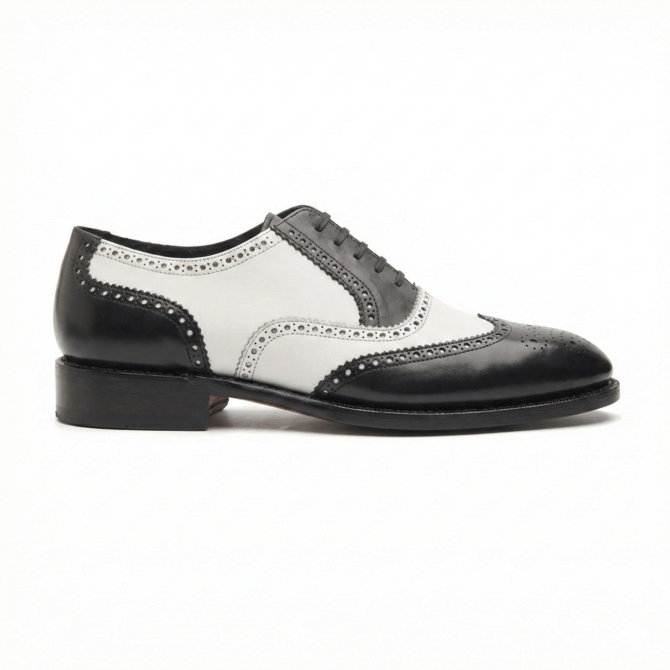 Rear view of black and white leather brogue shoes