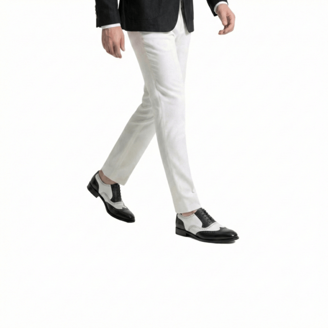 Top view of black and white leather brogue shoes for men