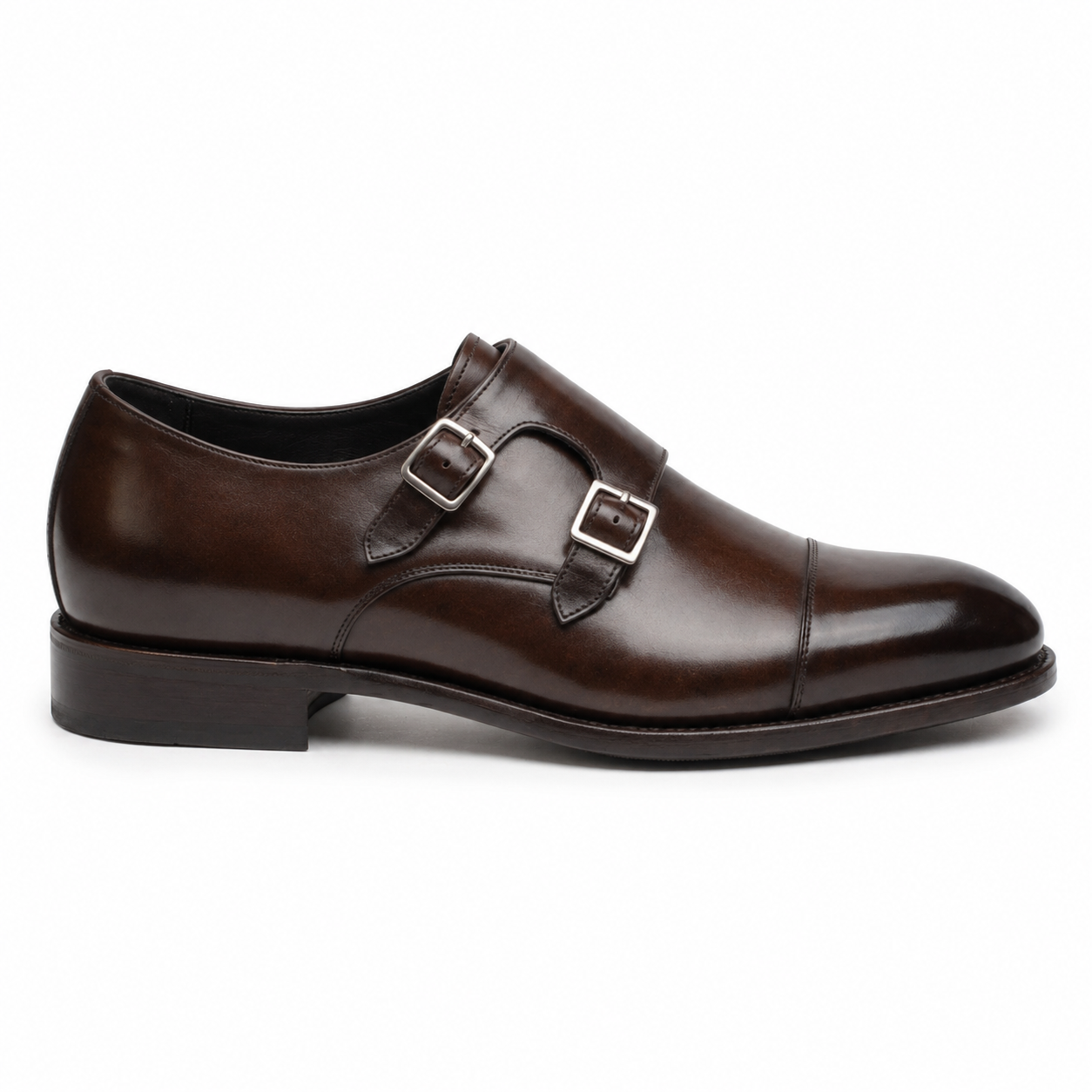 Side profile of dark brown leather double monk strap shoe