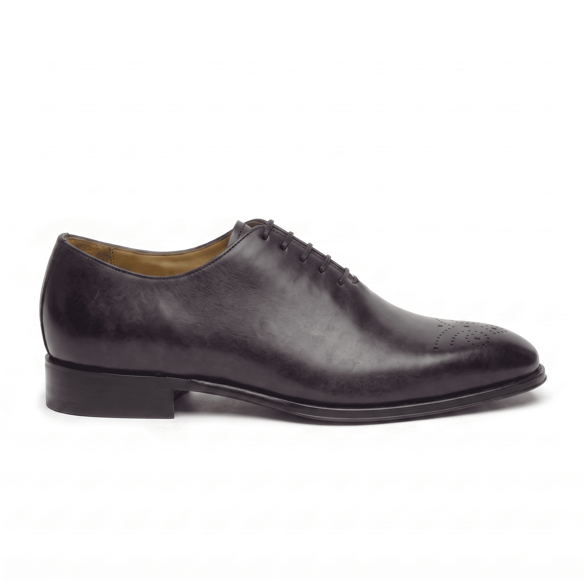 Side profile of dark brown leather lace-up dress shoe