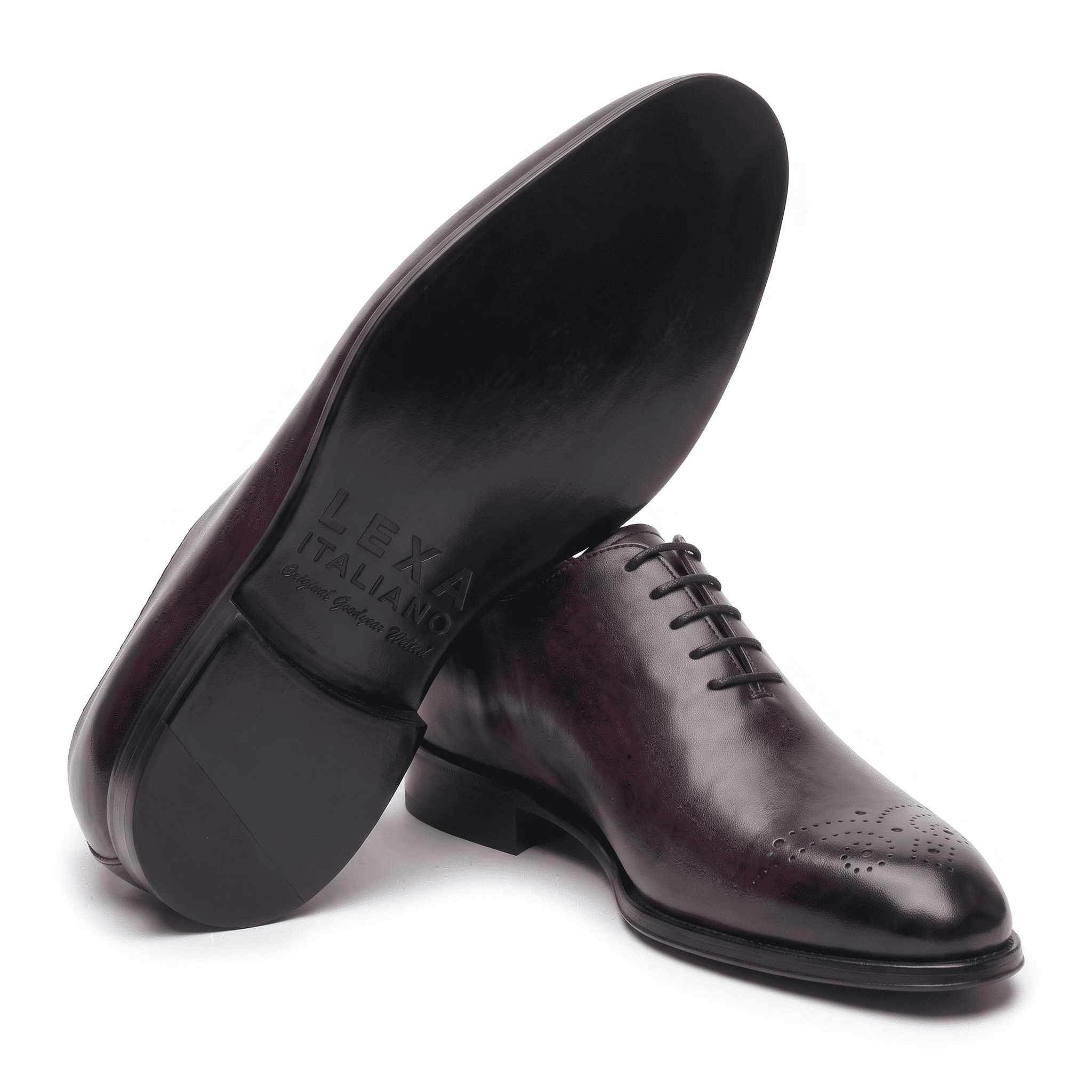 Dark brown leather dress shoe shown from bottom angle