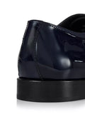 Elegant menβs patent leather dress shoes β angled view