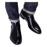 Classic black leather Chelsea boots for men styled for formal and casual wear