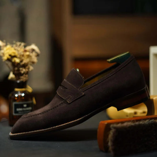 Hand-made dark brown suede penny loafers for men β front view