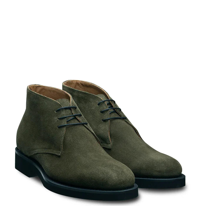 Men’s suede leather Chukkas boots showcasing lace-up design and sleek casual silhouette