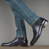 Men’s blue leather Chelsea boots with polished finish and clean silhouette