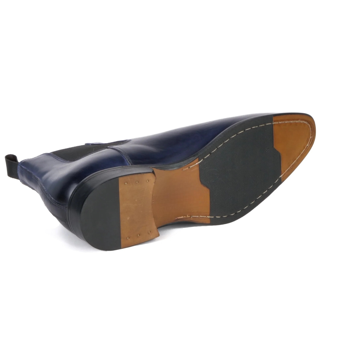 Sole view of premium men’s Chelsea boots with sturdy leather outsole