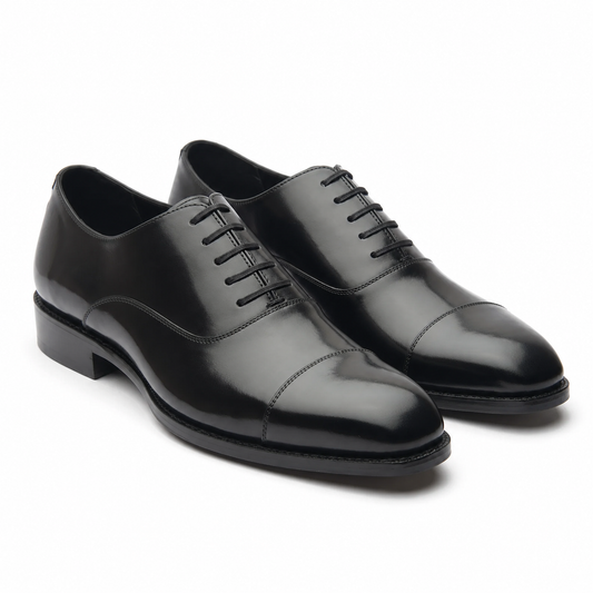 Black leather Oxford shoes for men with polished finish and classic cap-toe design