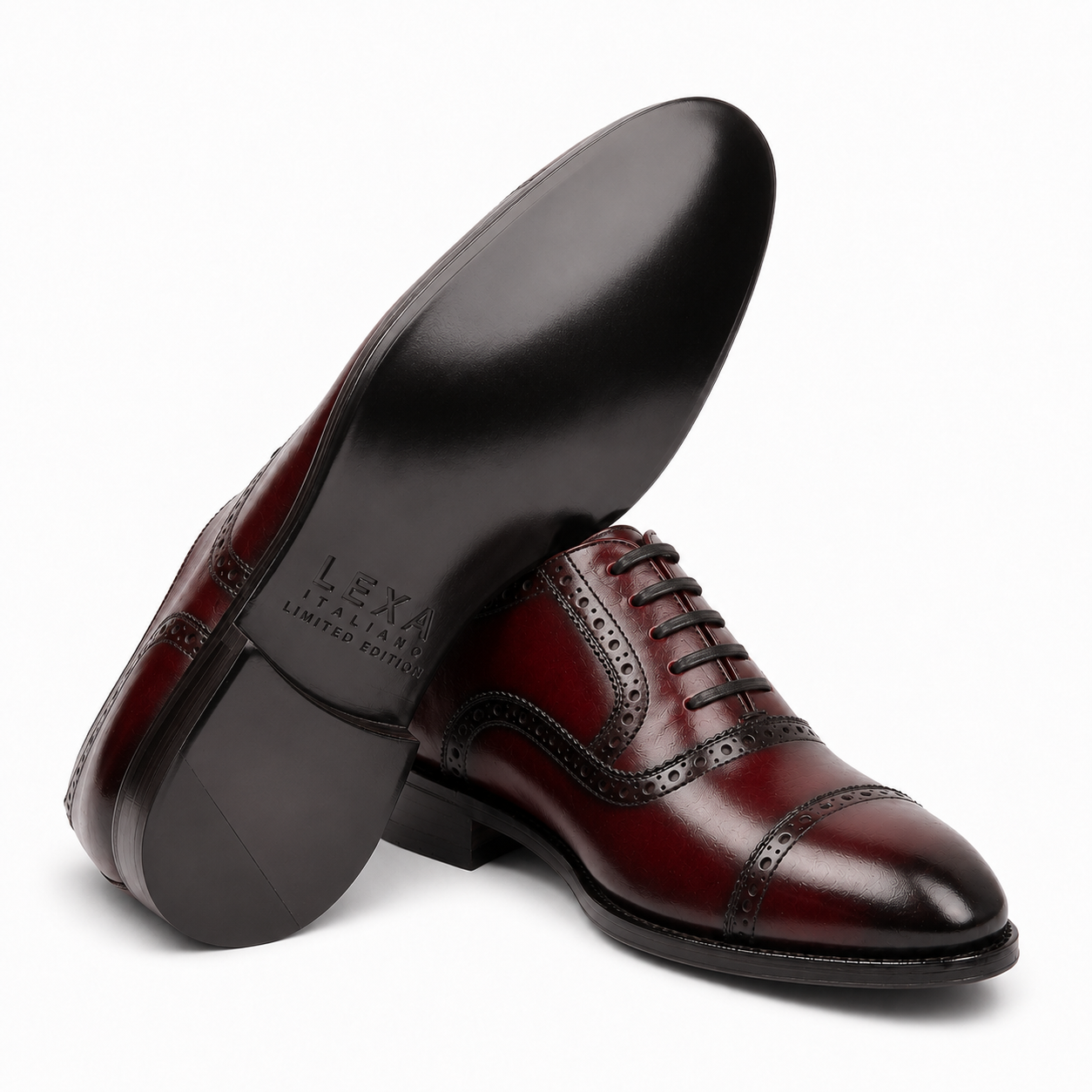 Burgundy leather brogue Oxford shoe showing the black leather sole and heel
