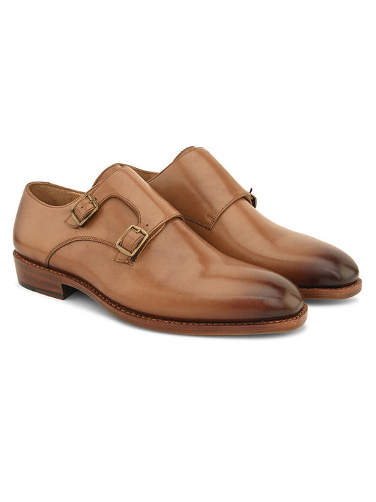 Elegant brown Blake-stitched leather shoes with minimal stitching and a sleek formal design