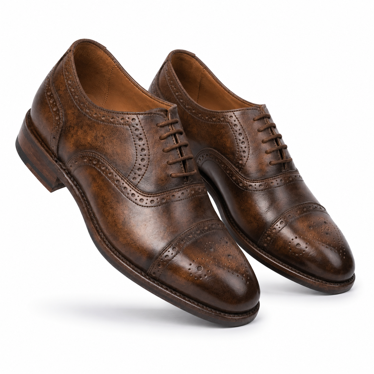 Brown brogue Derby shoes shown in crossed side view