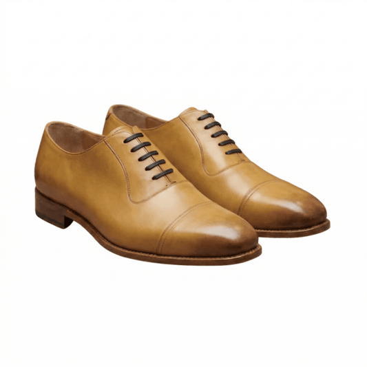 Almond tan wholecut oxford shoes premium leather front angled view