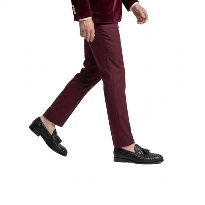 Elegant black woven leather loafers styled with modern burgundy formal menswear