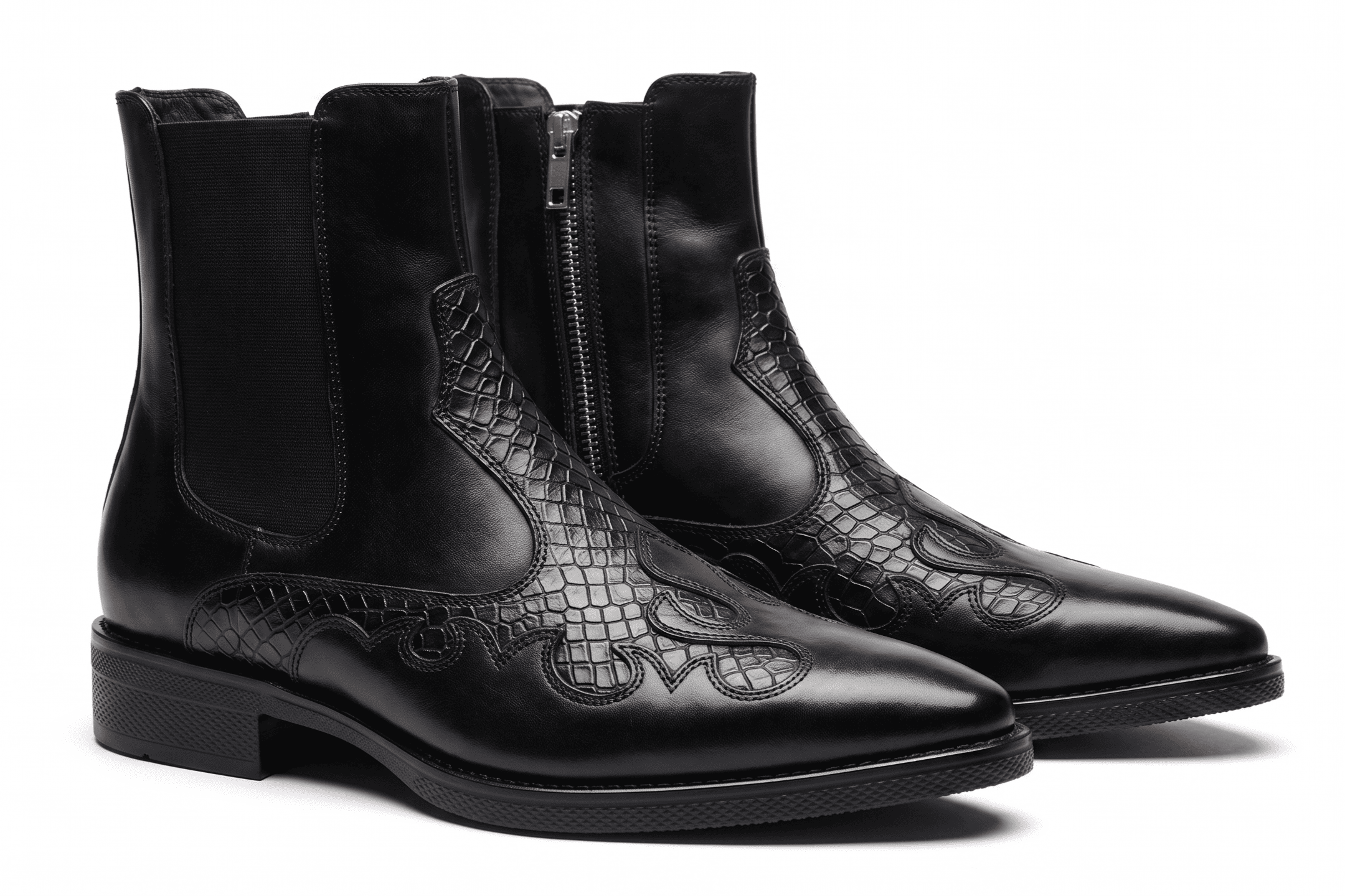A pair of premium black leather Chelsea boots with intricate western-style embroidery on the vamp and a side zipper.
