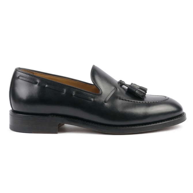 black leather tassel loafer side view elegant slip on shoe