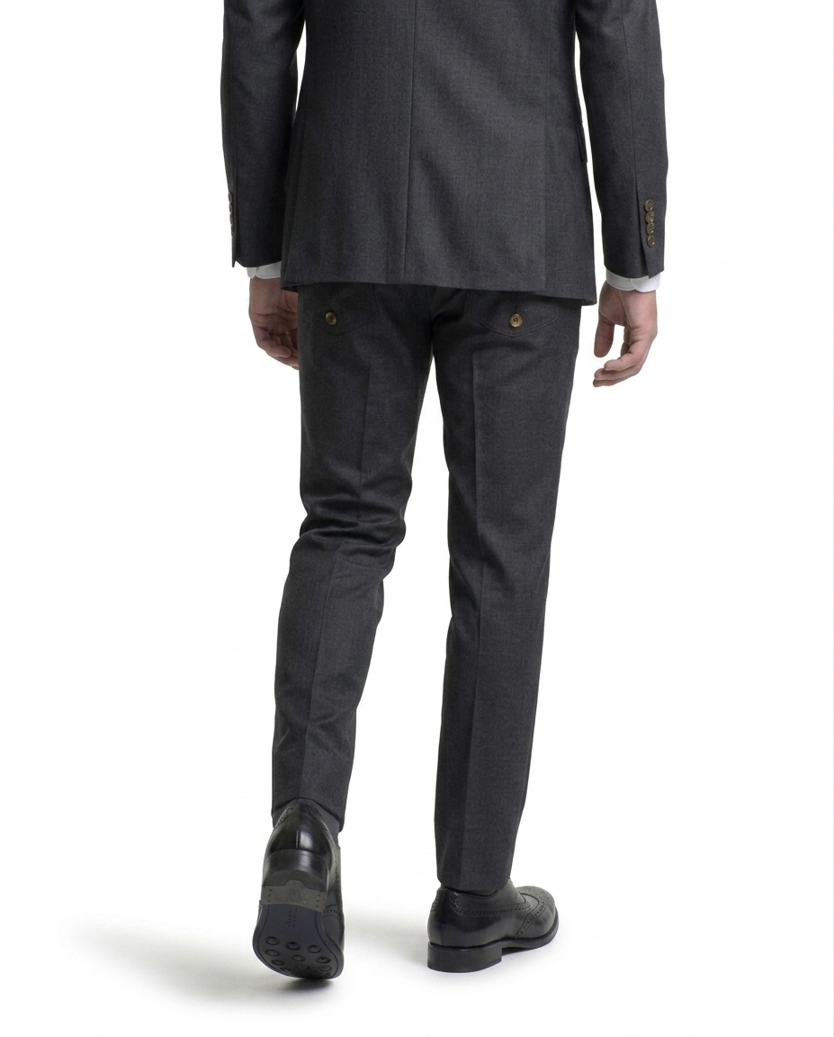 Back view of man in grey suit wearing black leather oxford dress shoes walking on white background