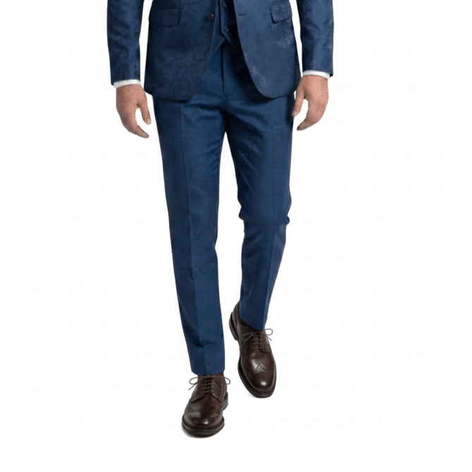 Front styling view of brown brogue shoes with navy blue suit