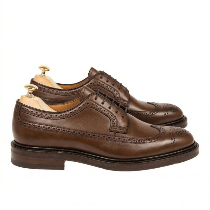 Side profile of brown leather brogue formal shoes for men