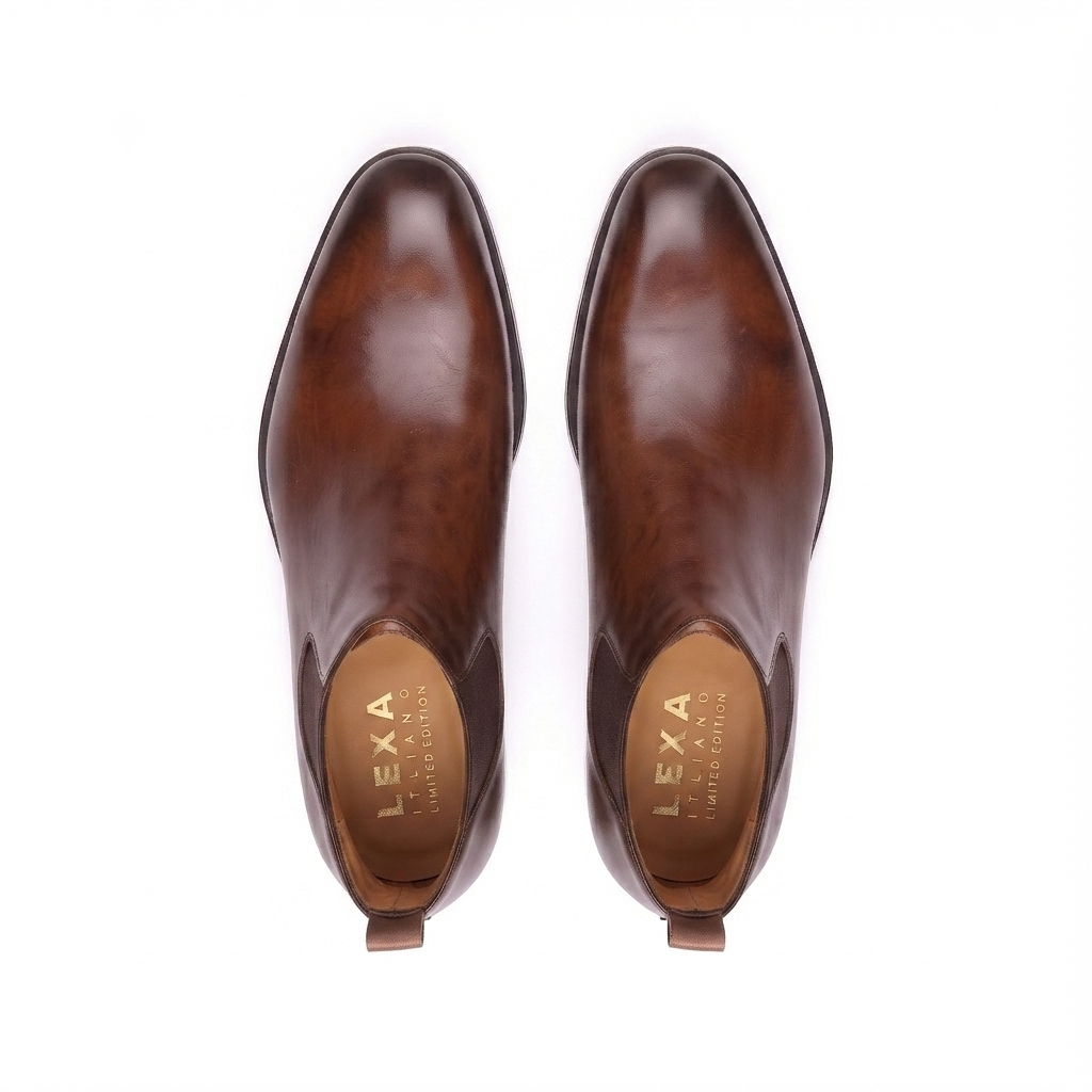 Top view of brown genuine leather Chelsea boots for men showcasing the premium finish and handcrafted construction.
