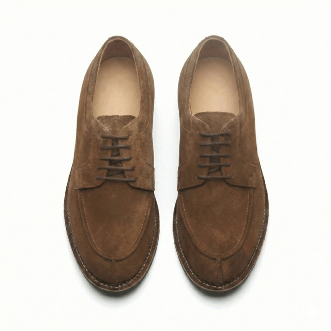 Front view of brown suede derby shoes with lace-up design