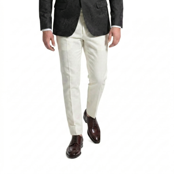 Front styling view of burgundy Oxford shoes with white trousers