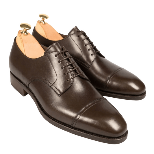 Dark brown leather cap toe Oxford shoes for men front angle view