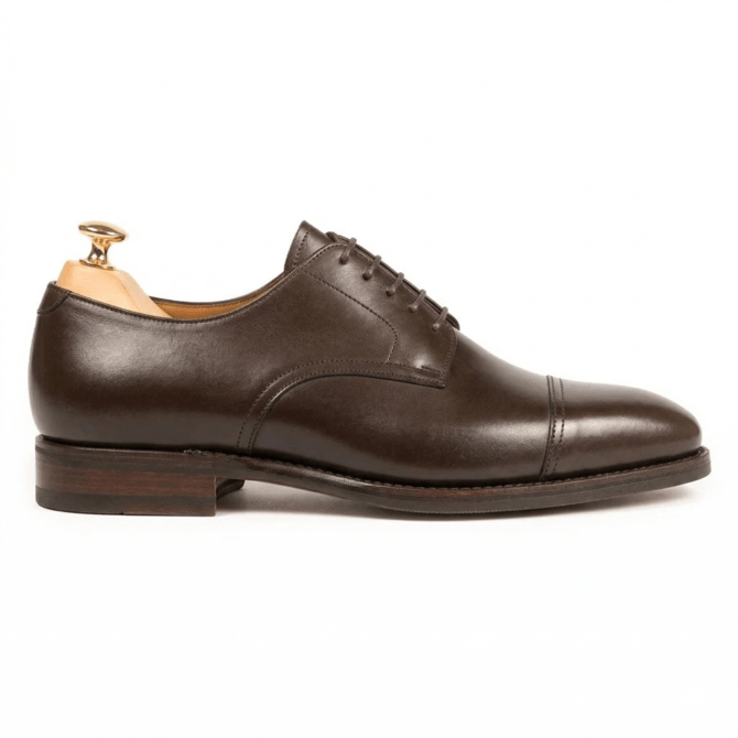 Side profile of dark brown leather Oxford formal shoes for men