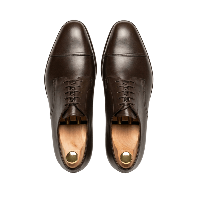 Top view of dark brown genuine leather Oxford shoes for men
