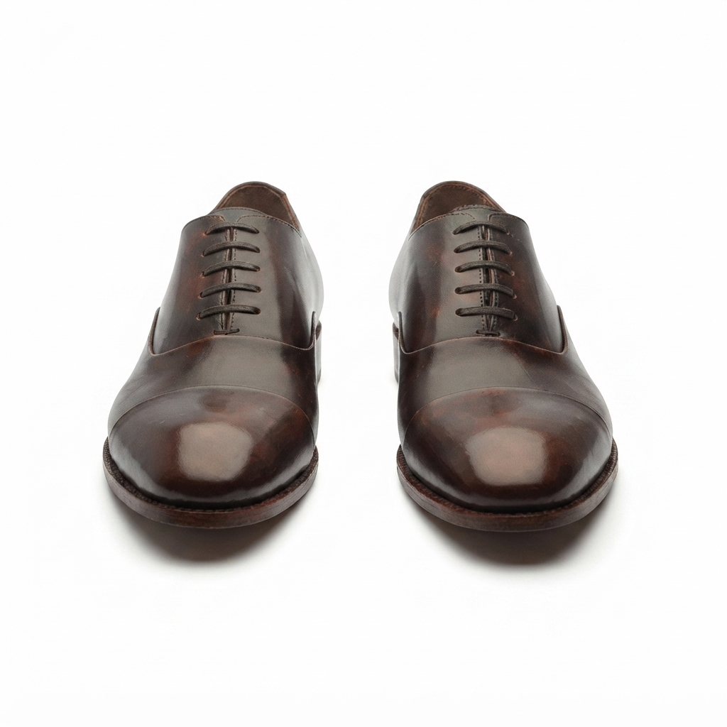 Brown leather Oxford shoes for men shown from the front