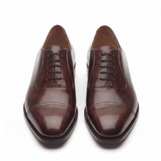 Front top view of burgundy brown leather Oxford shoes for men