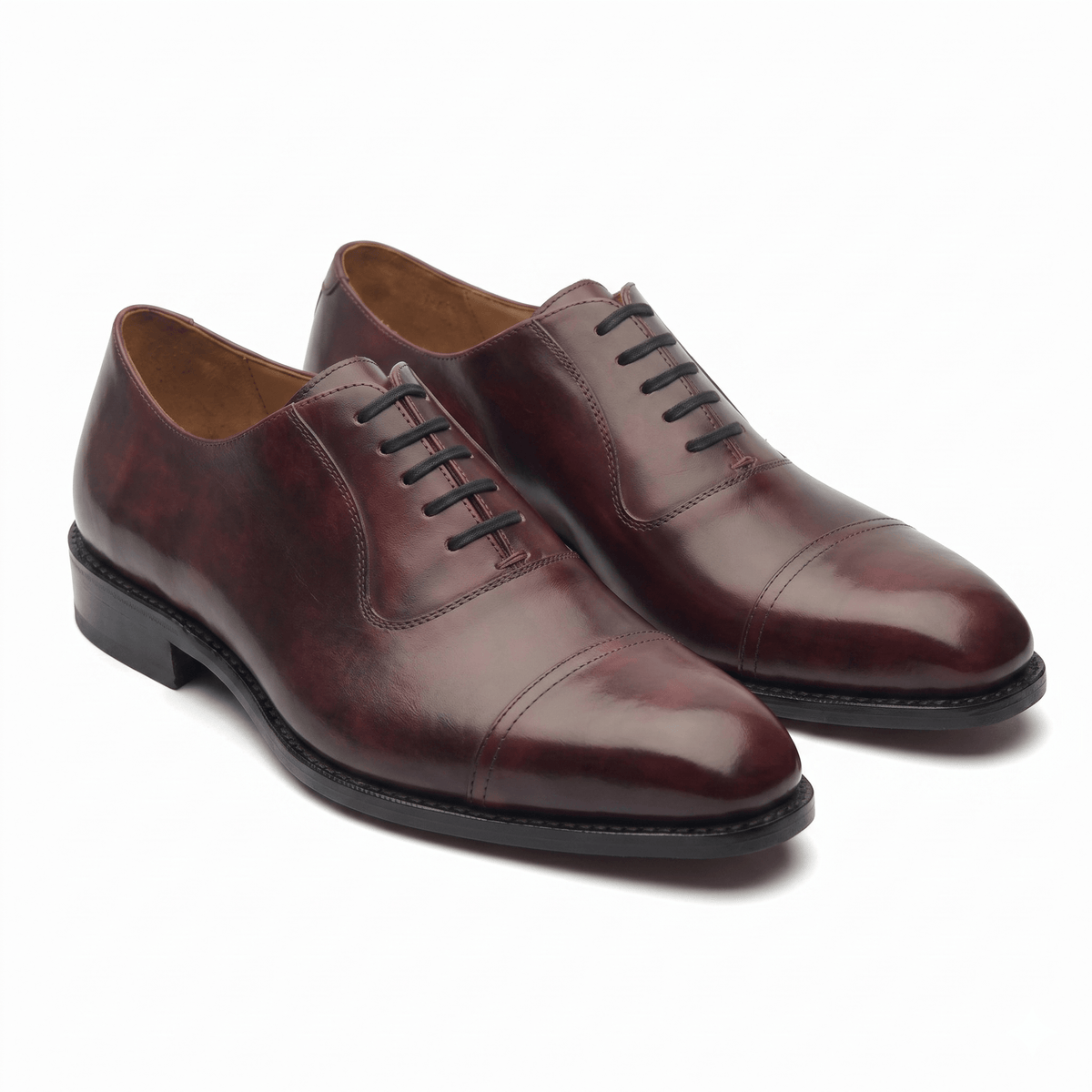 Burgundy brown leather Oxford shoes for men with a polished formal finish
