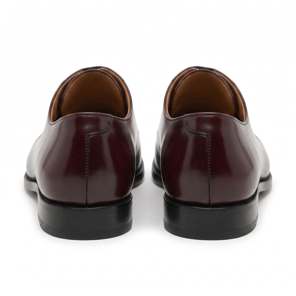 Rear view of burgundy brown leather Oxford shoes showing the heel design