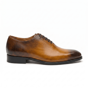 Front view of brown leather lace-up dress shoes