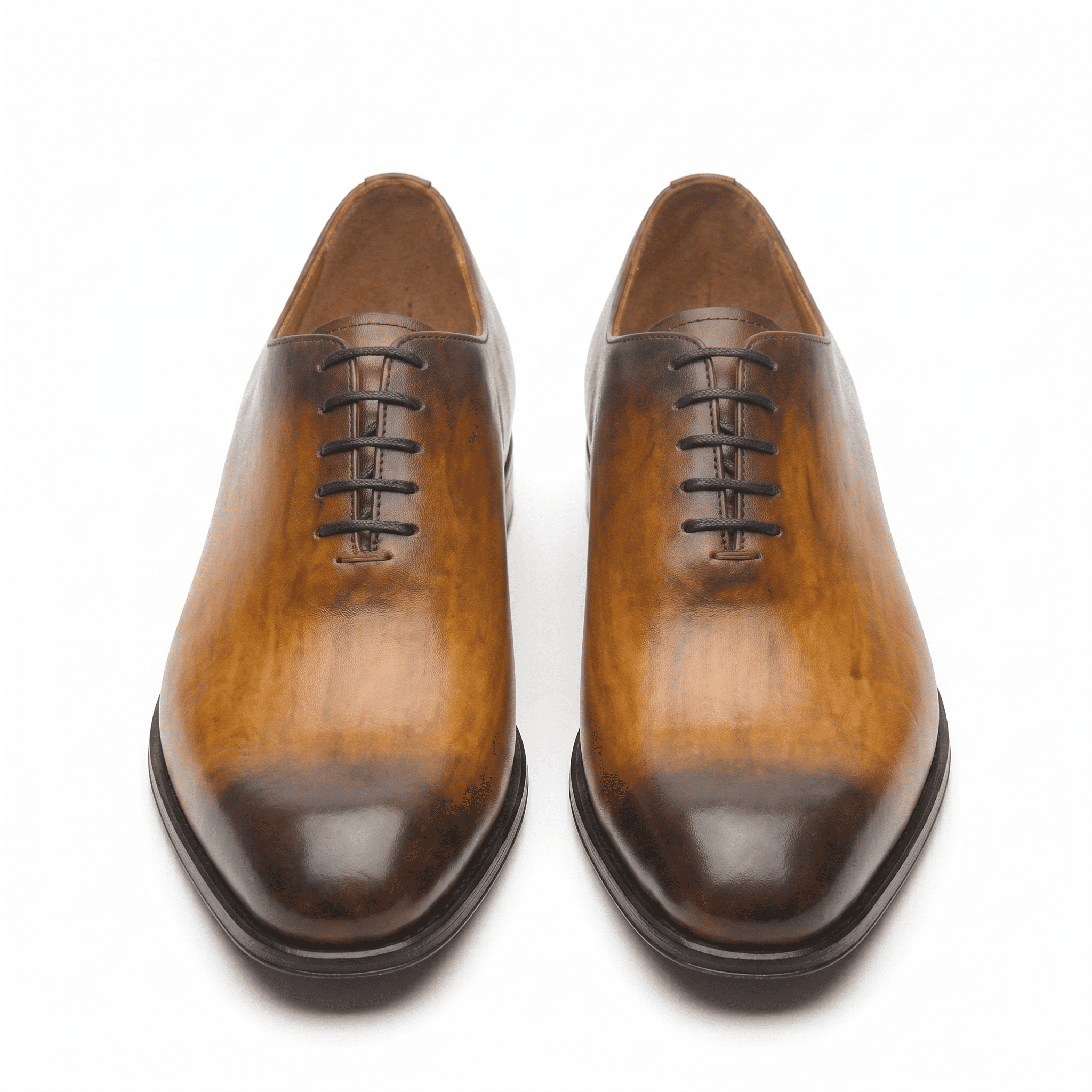 Top view of brown leather lace-up dress shoes pair