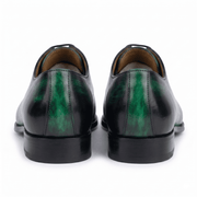 Back view of green leather lace-up dress shoes