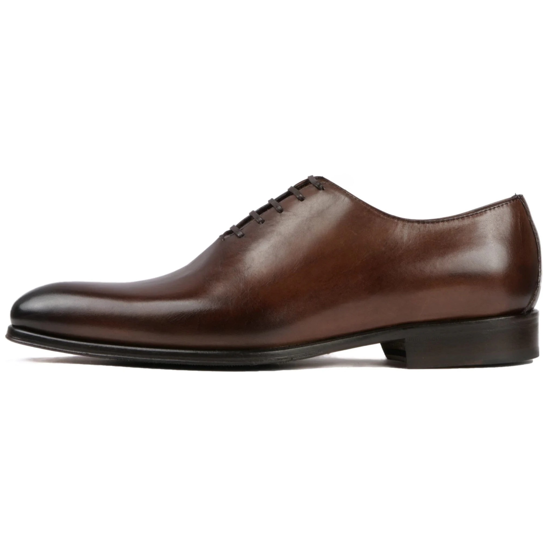 Handcrafted brown leather Benson Wholecut Oxford showing fine stitching
