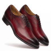 Burgundy leather lace-up dress shoes three-quarter view