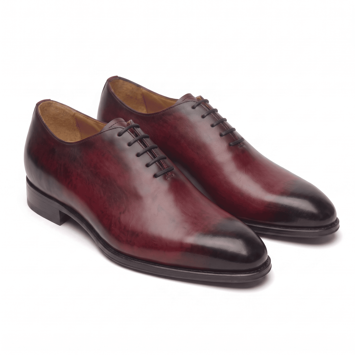 Burgundy leather lace-up dress shoes with handcrafted finish