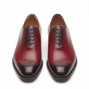 Front view of burgundy leather lace-up dress shoes