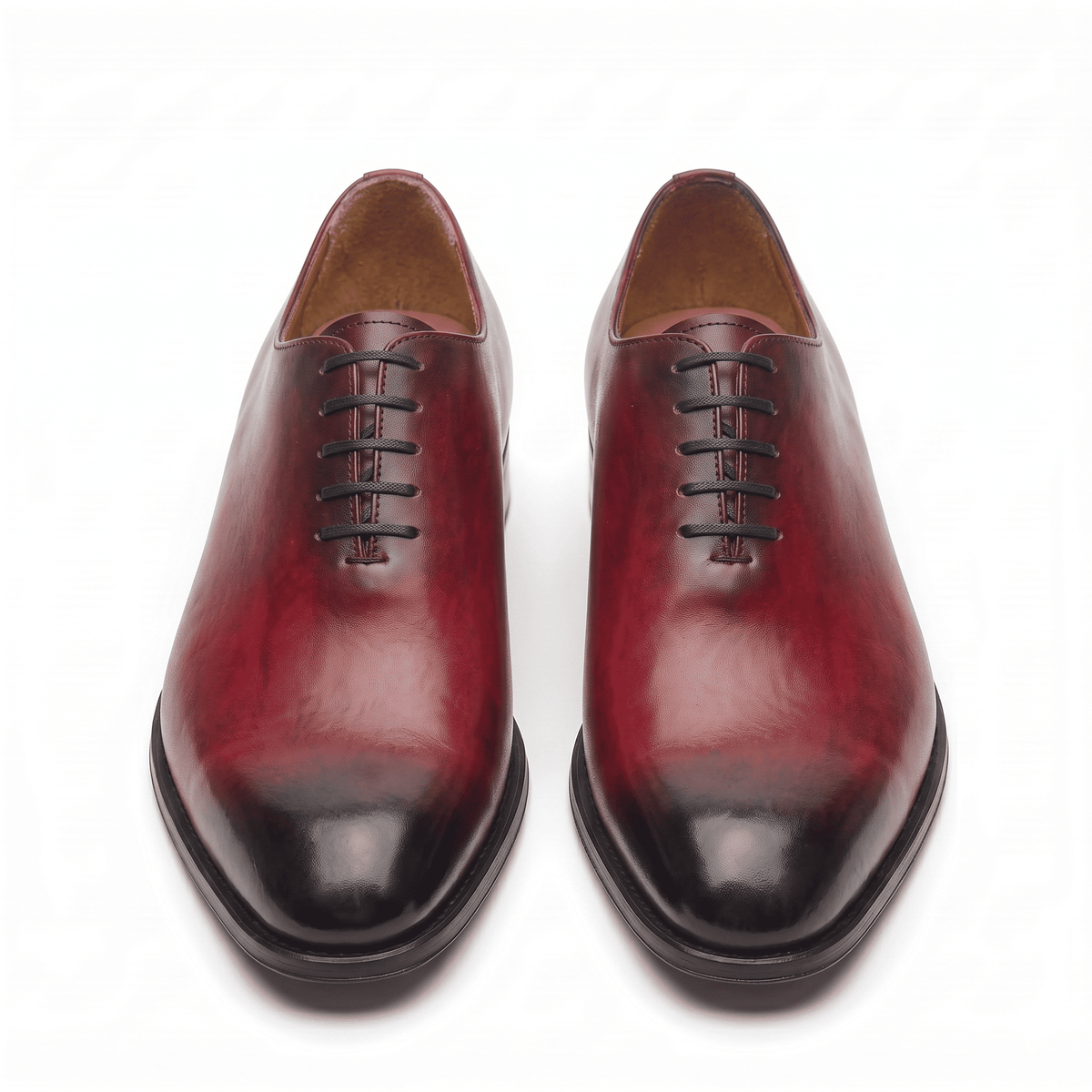 Front view of burgundy leather lace-up dress shoes