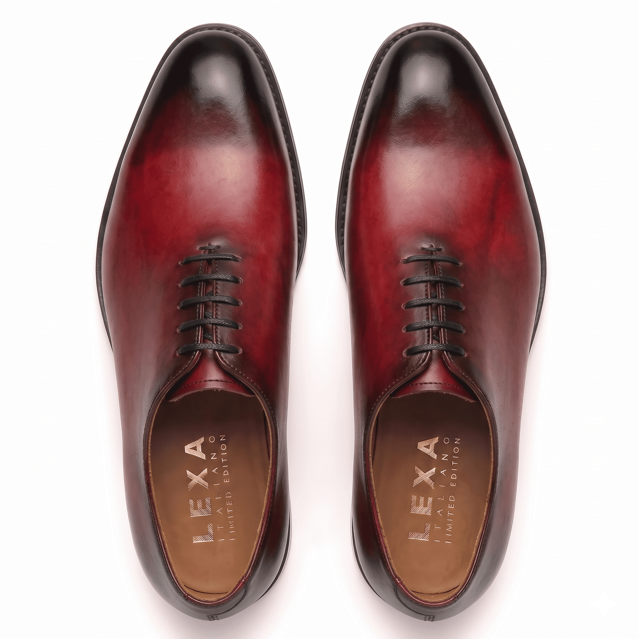 Top view of burgundy leather lace-up dress shoes